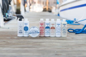 Collinite Marine products lined up on a dock